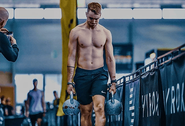 man taking a HYROX class at SA1 Training Club
